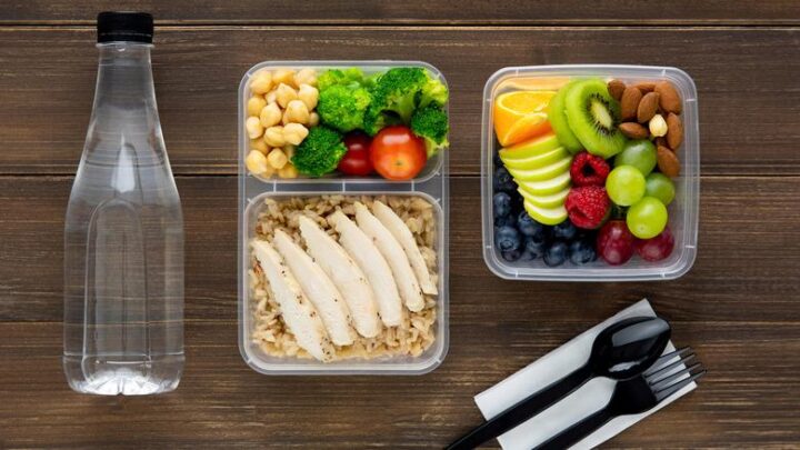 Balanced workplace nutrition with healthy meals, protein, whole grains, fruits, vegetables and drinking water
